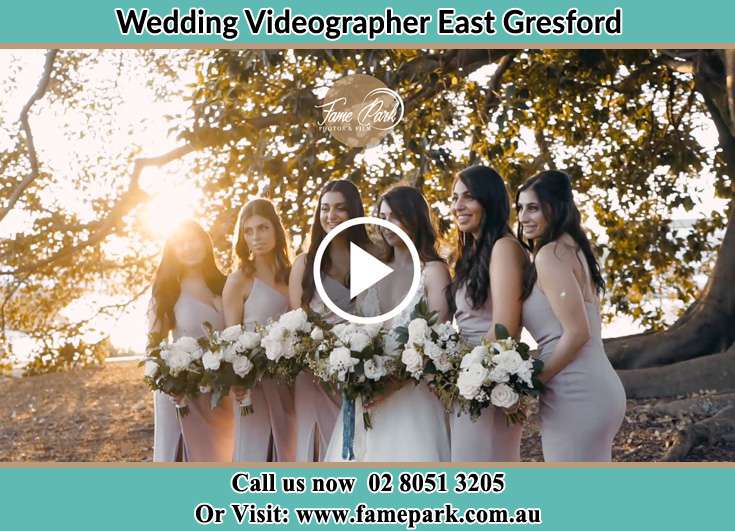 The Bride posing for the camera with her bridesmaids East Gresford NSW 2311